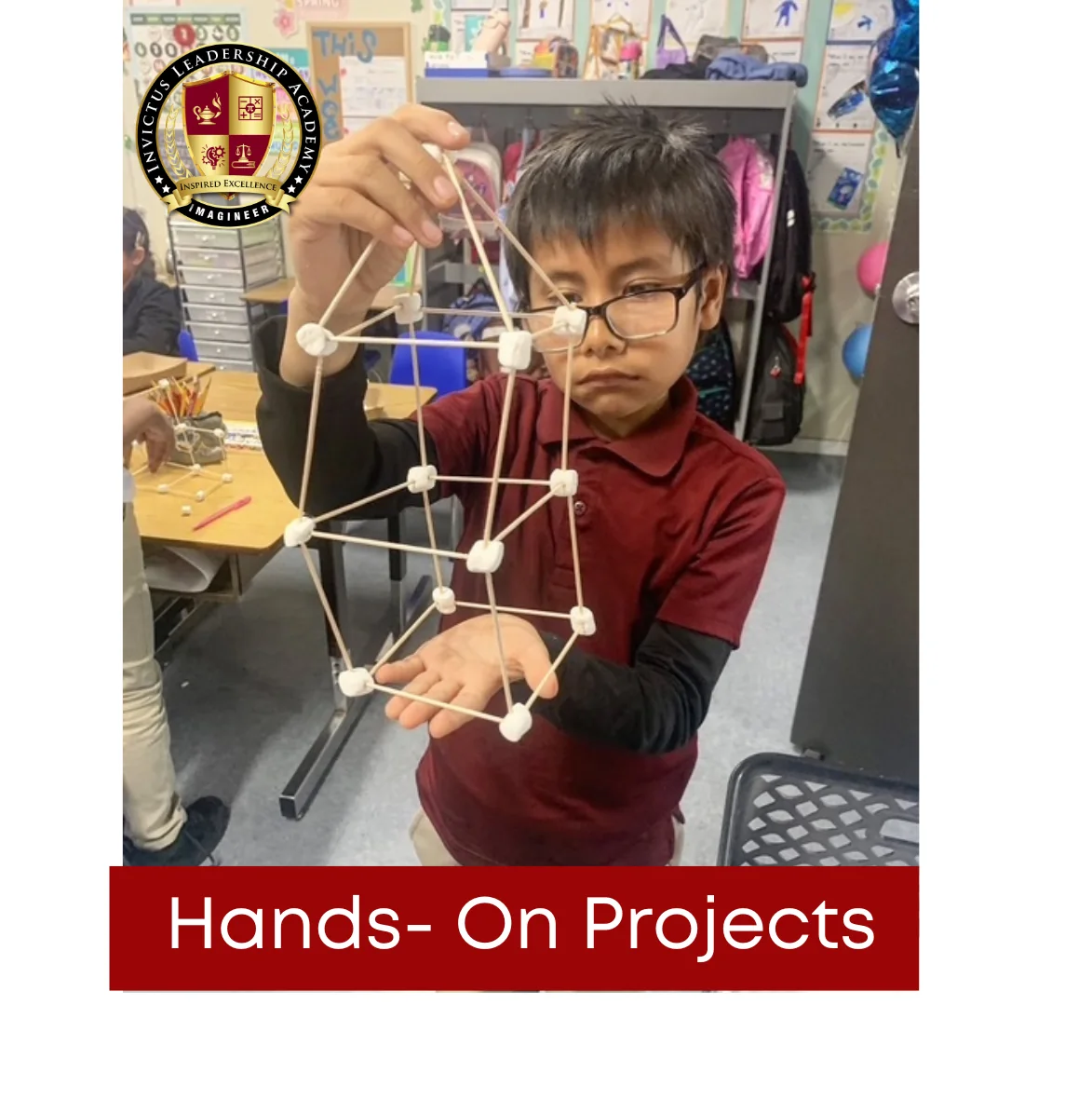An Invictus Leadership Academy student displays a hands-on STEM project