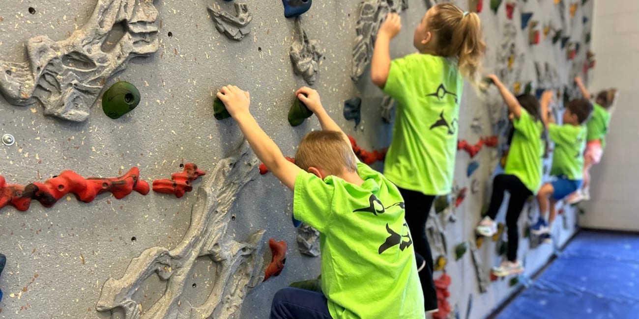 Firestone Charter Academy students climbing indoors