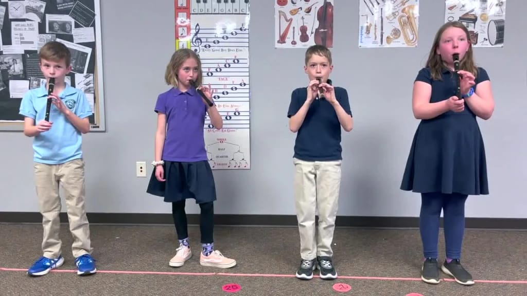Firestone Charter Academy students performing together