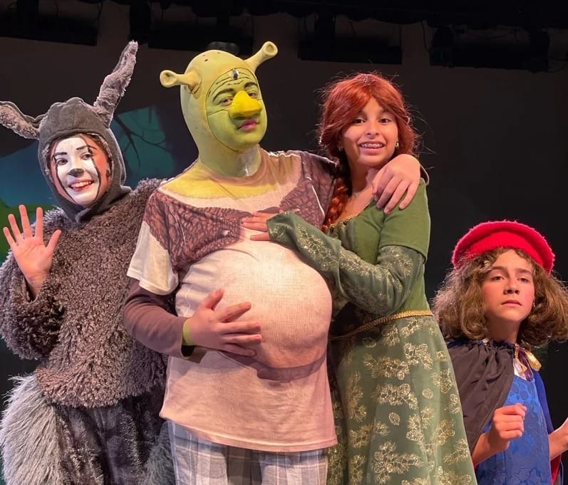 Rocky Mount Academy students performing in a theatre production.