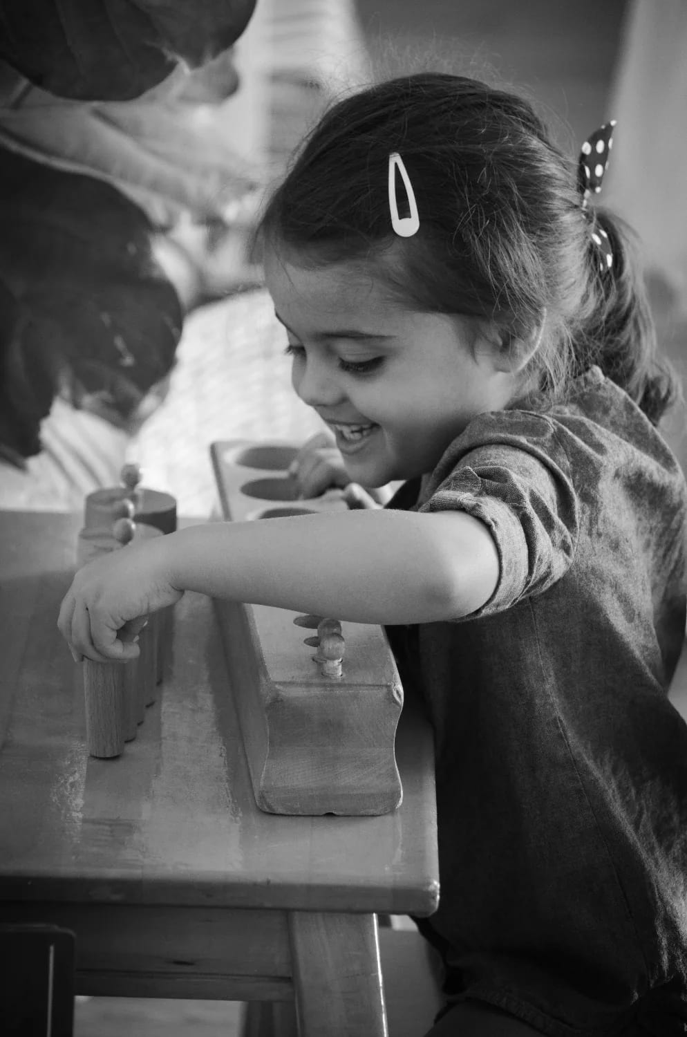 Fernwood Montessori School in Bethesda: child working with materials in a Fernwood Montessori classroom.