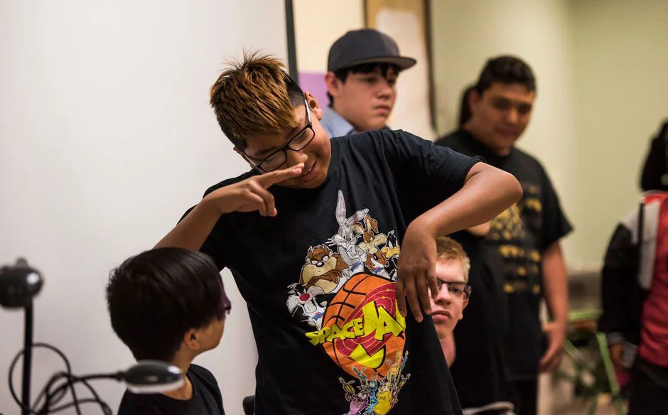 Albuquerque Sign Language Academy students using sign language during a school activity.