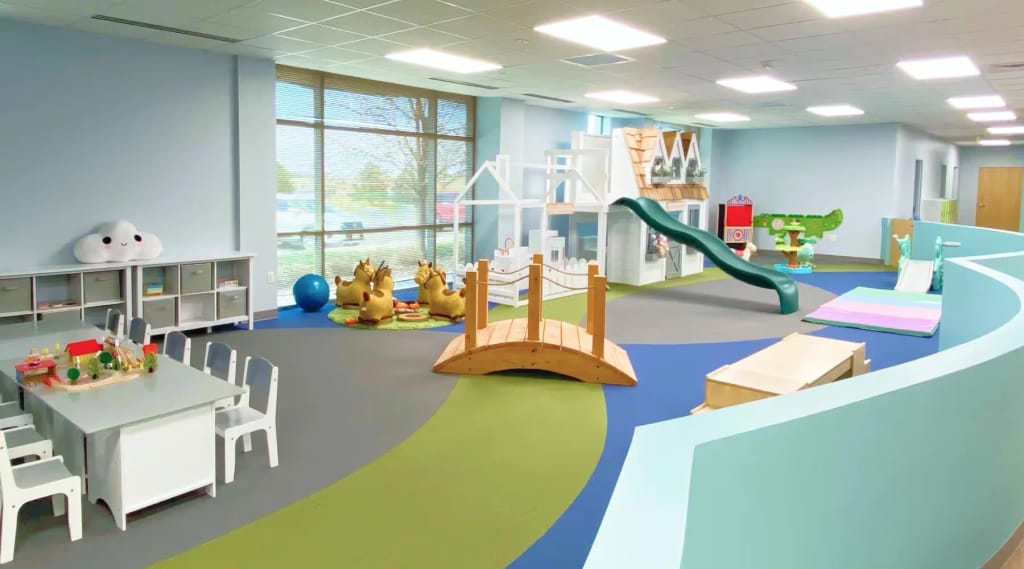 Colorful play room inside an Action Behavior Centers care center