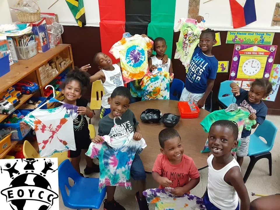 East Orange Youth Cultural students displaying classroom art projects