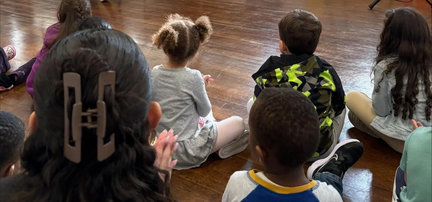 Edward F. Leddy Preschool students attend a school gathering.
