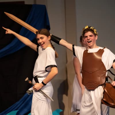 Ambleside of the Willamette Valley students performing together in a school production.