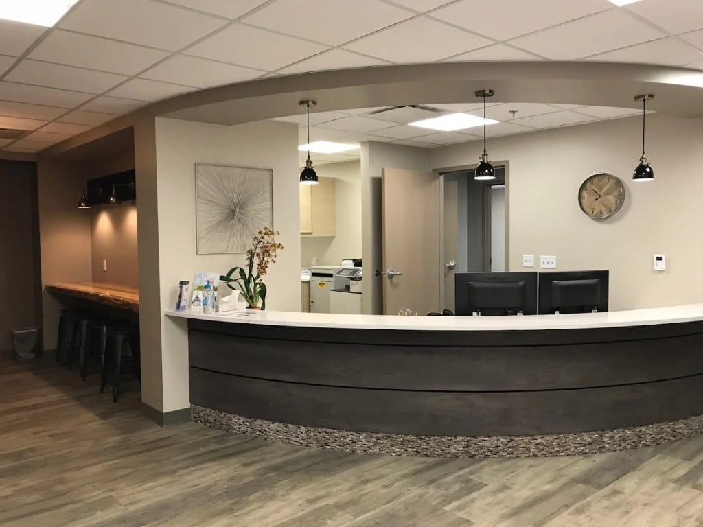 Reception desk inside Woven Care Tri-Lakes