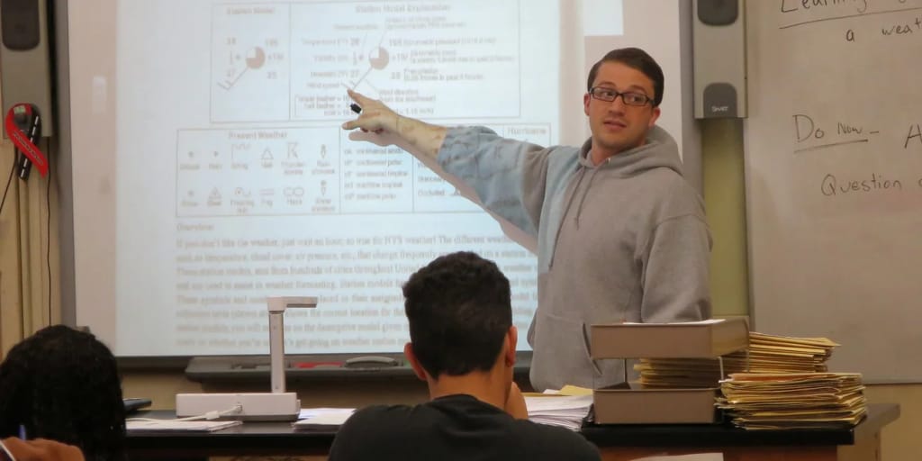 Ralph R. McKee teacher presenting a classroom lesson