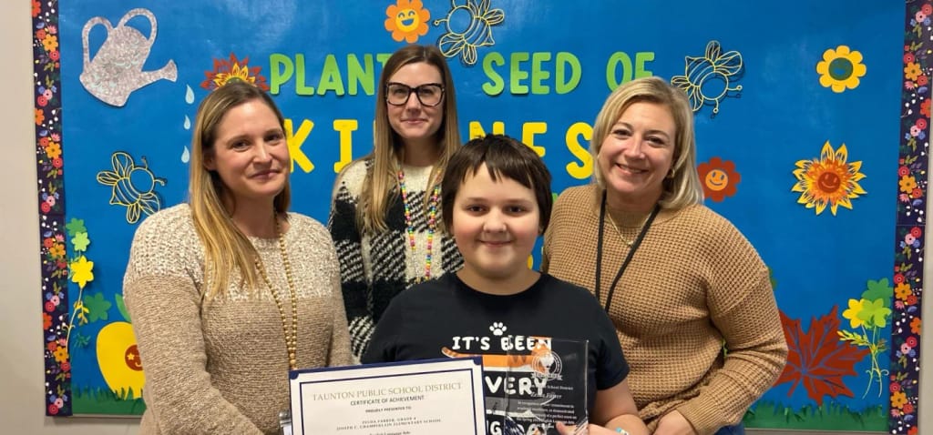Chamberlain School students and staff celebrate a school achievement.
