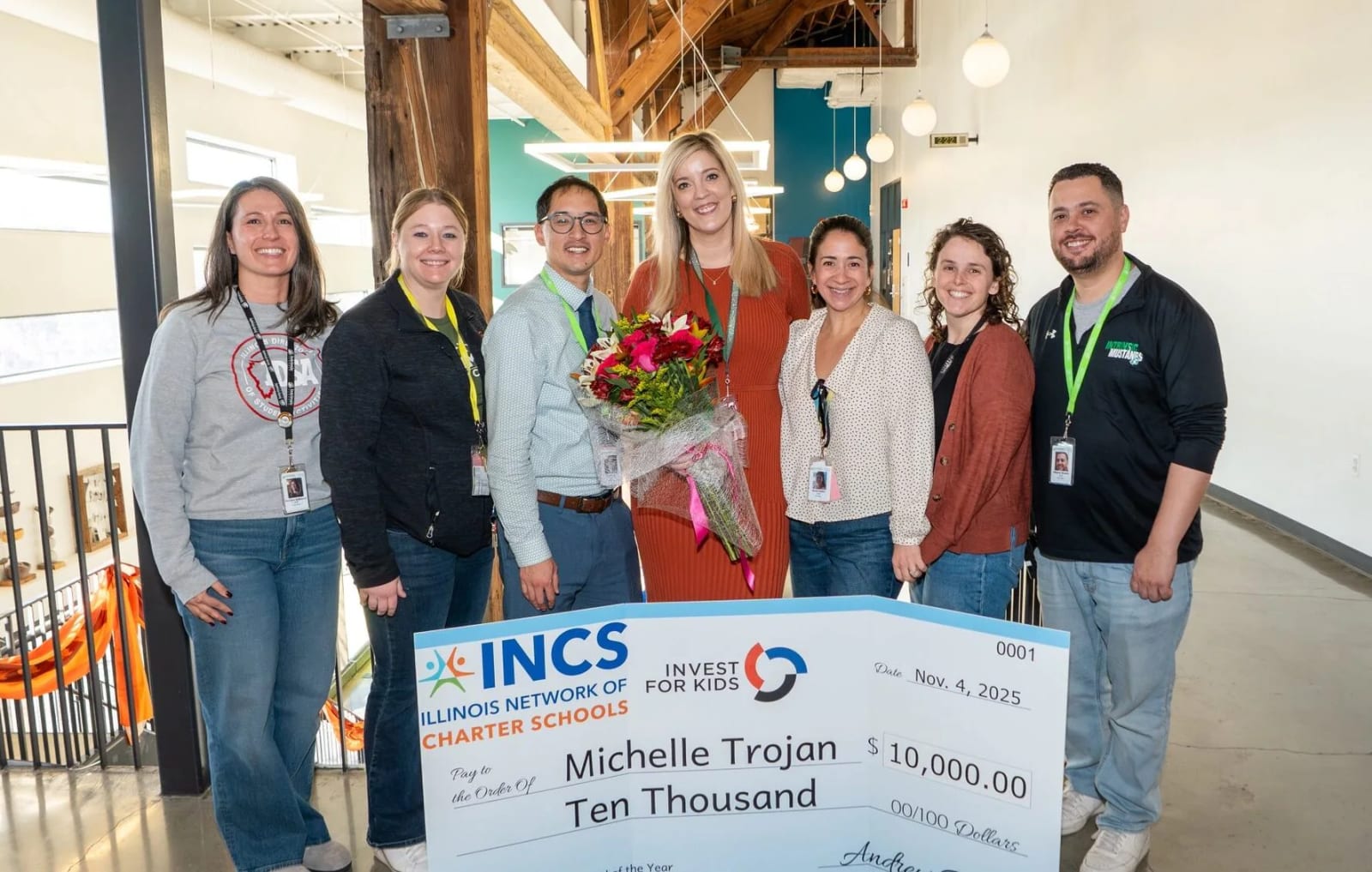 School staff celebrating an achievement at Intrinsic Downtown Campus 1