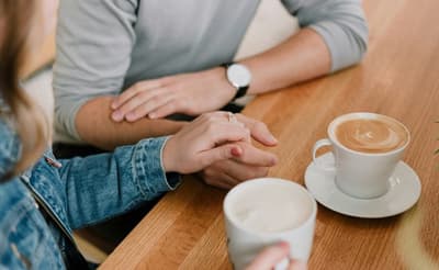 Two people supporting each other