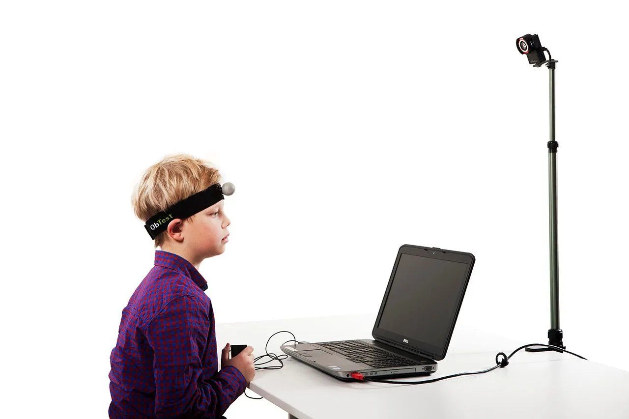 Child taking the QbTest