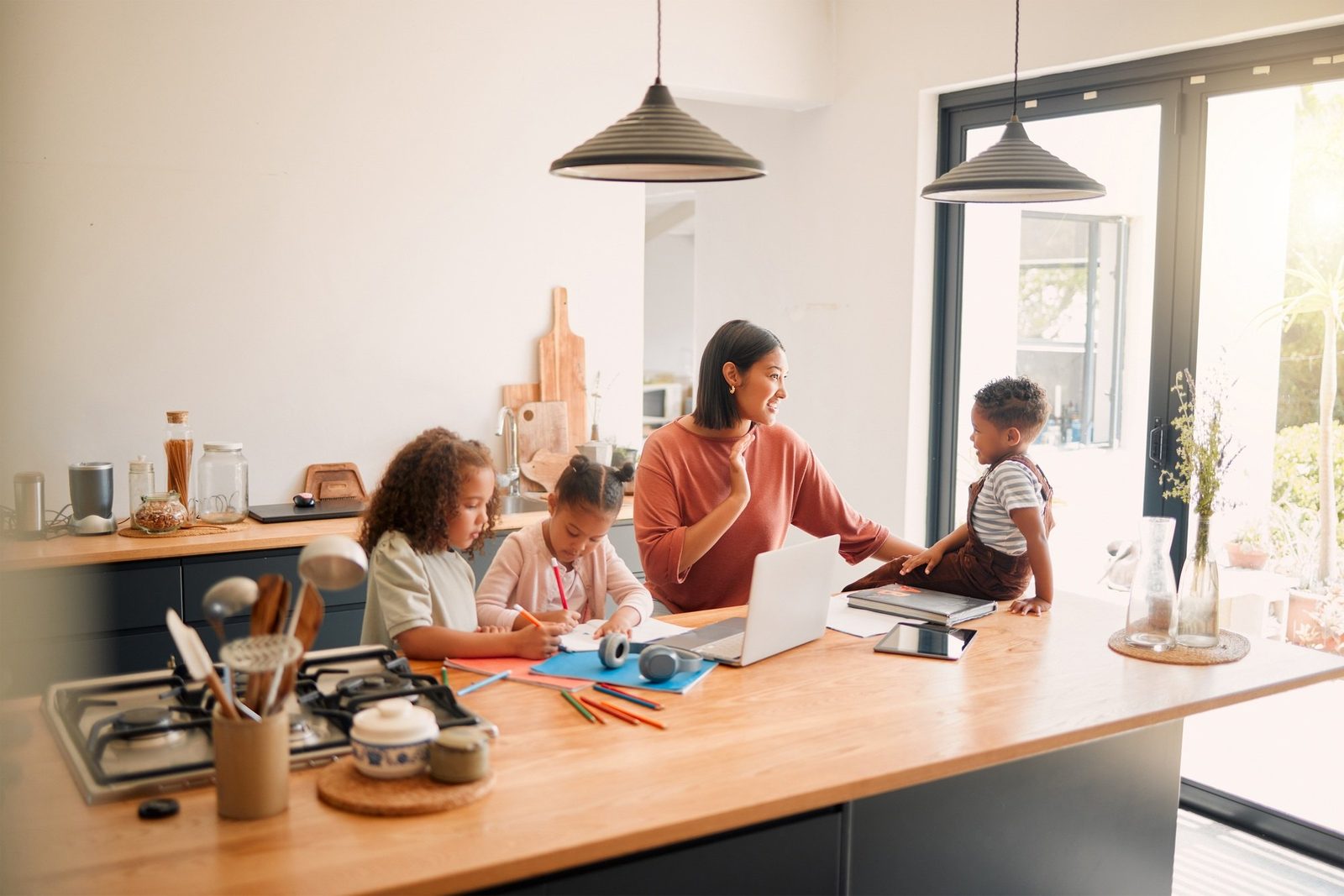 Parent helping children with homework