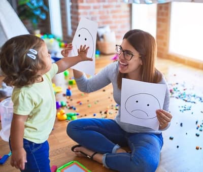 Child and psychologist in a session