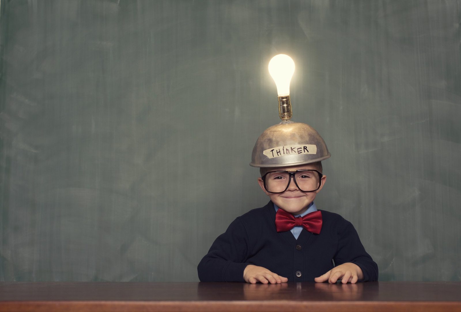 Child at a desk ready for testing