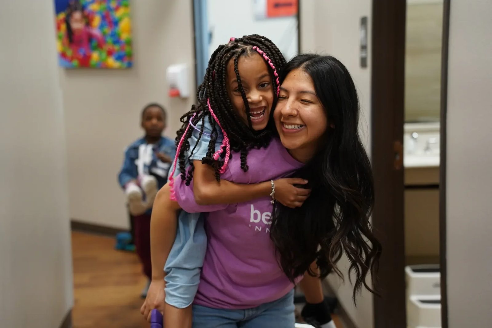 Provider-published image of a child and therapy staff