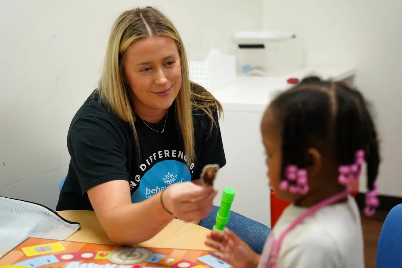 Provider-published image of a child and therapy staff