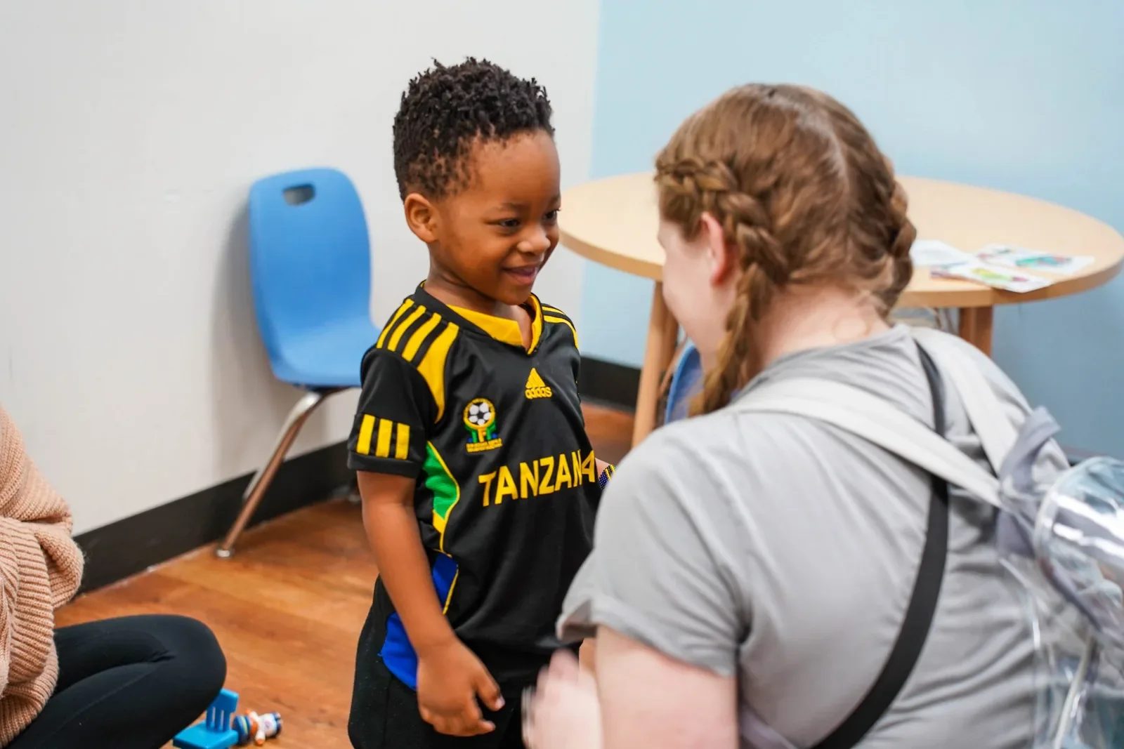 Provider-published image of a child and therapy staff