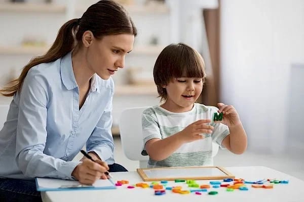 Provider-published image of a child and therapy staff