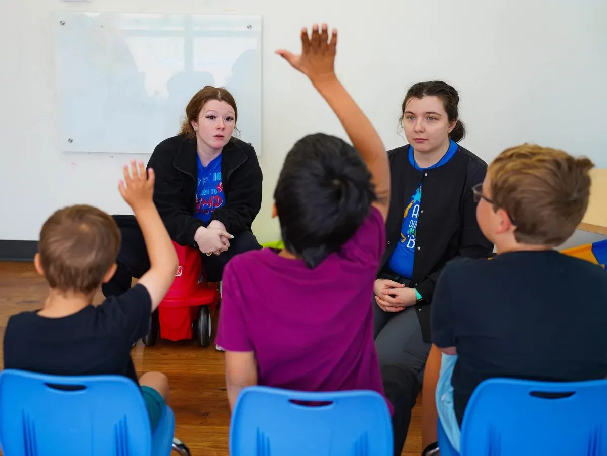 Provider-published image of a child and therapy staff