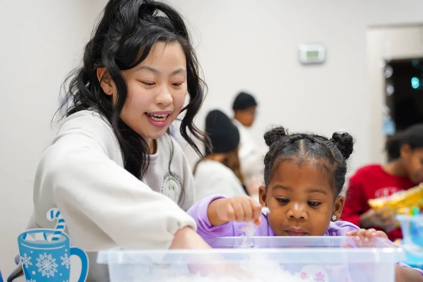 Provider-published image of a child and therapy staff