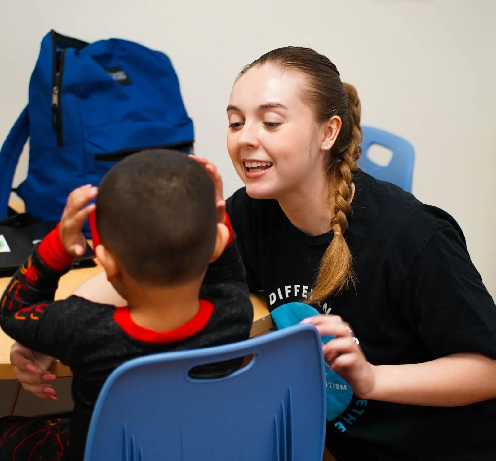 Provider-published image of a child and therapy staff