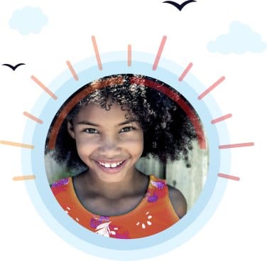 Smiling child pictured in a colorful circular frame