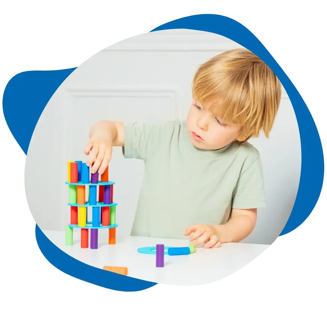 Child playing with a colorful toy
