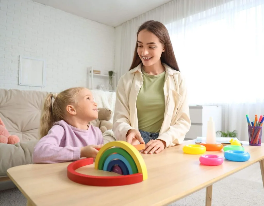 Adult and child working together at a table