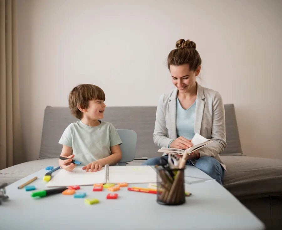 Therapist working with a child during in-home ABA therapy in Utah