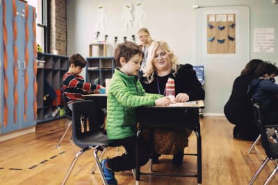 Students learning together in a classroom at Black Bear Academy