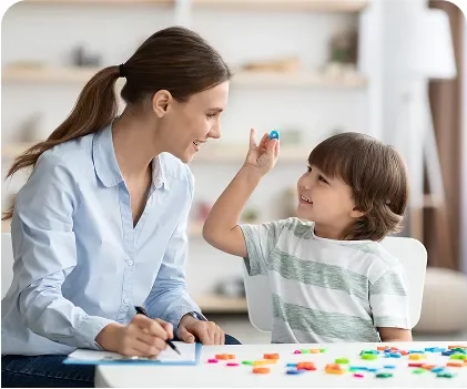 Adult and child working together during a learning activity