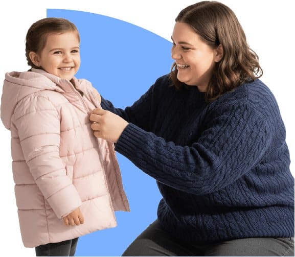 Therapist helping a child with daily living skills