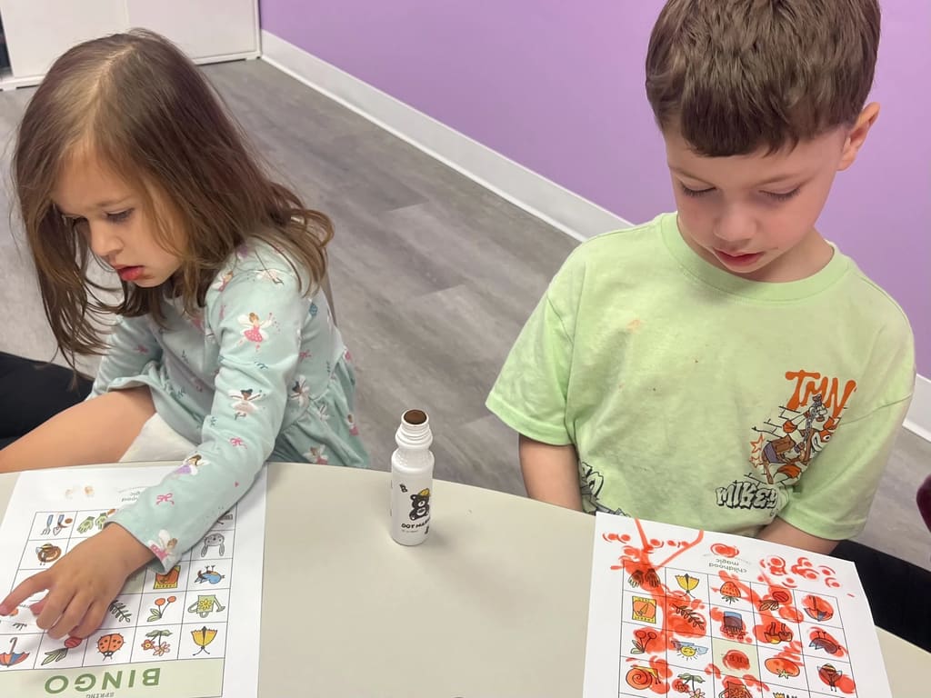 Children participating in group game activity and social interaction