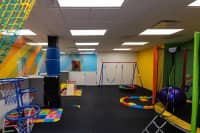 Colorful indoor sensory and movement area at Harmony ABA Centers
